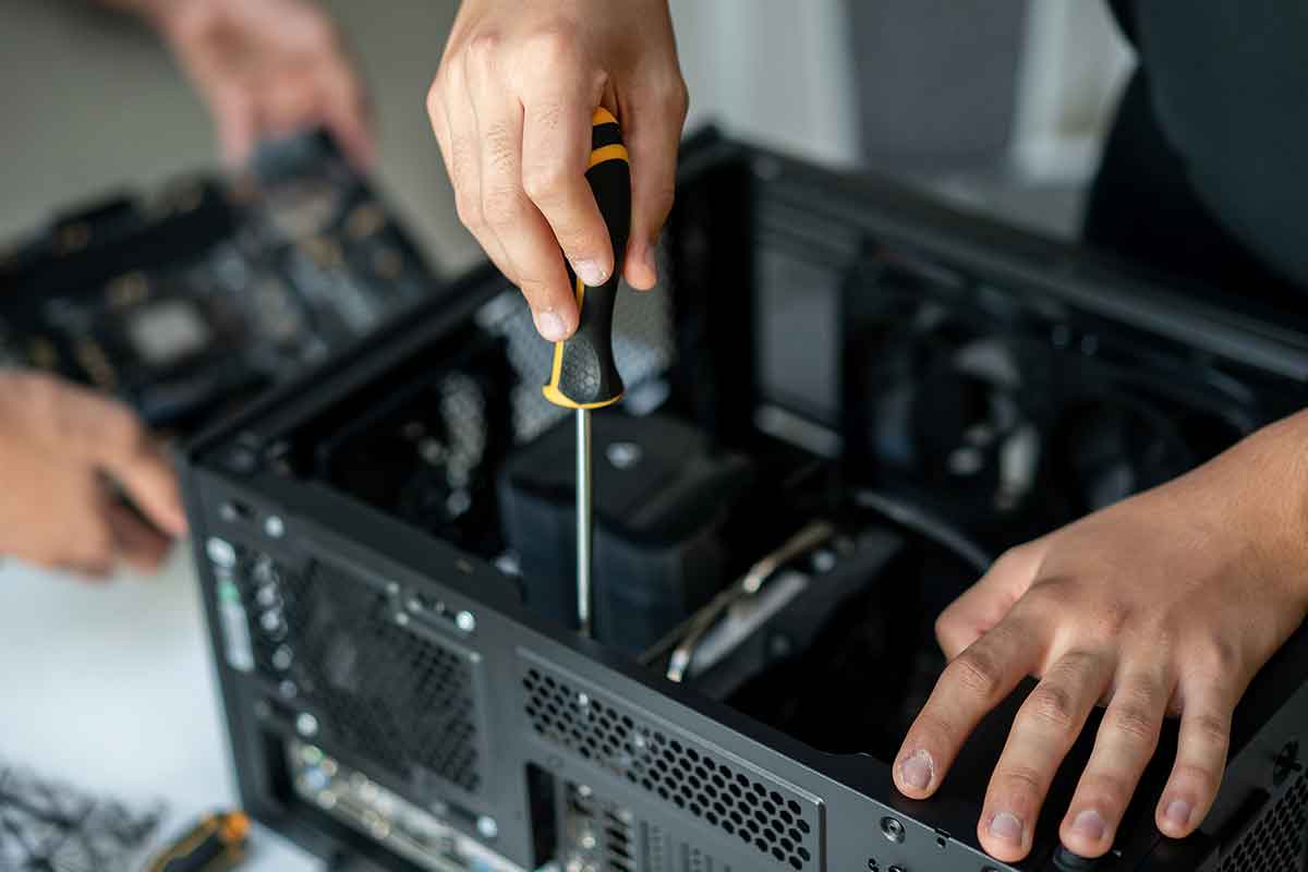 Computer Repair Prescott - A computer repair technician installing a video card.