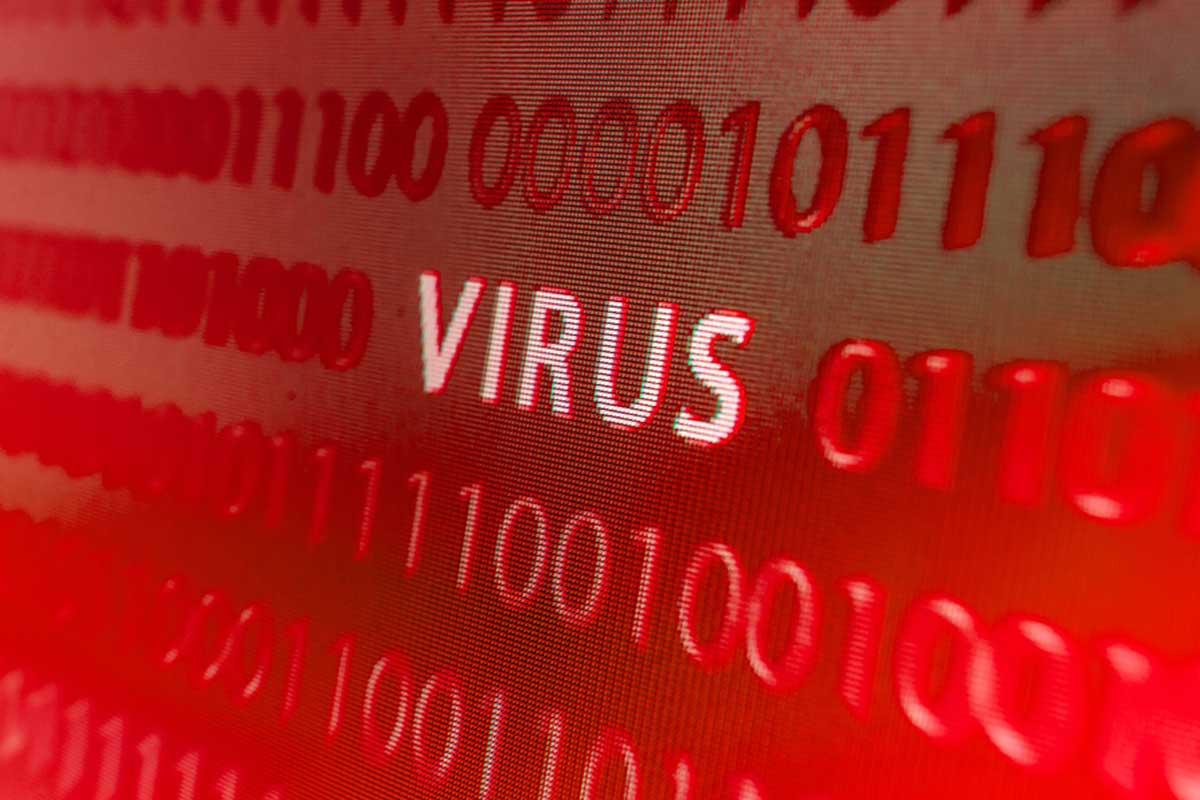 A bright red, intense image showing ones and zeroes and the word "virus" in white caps.