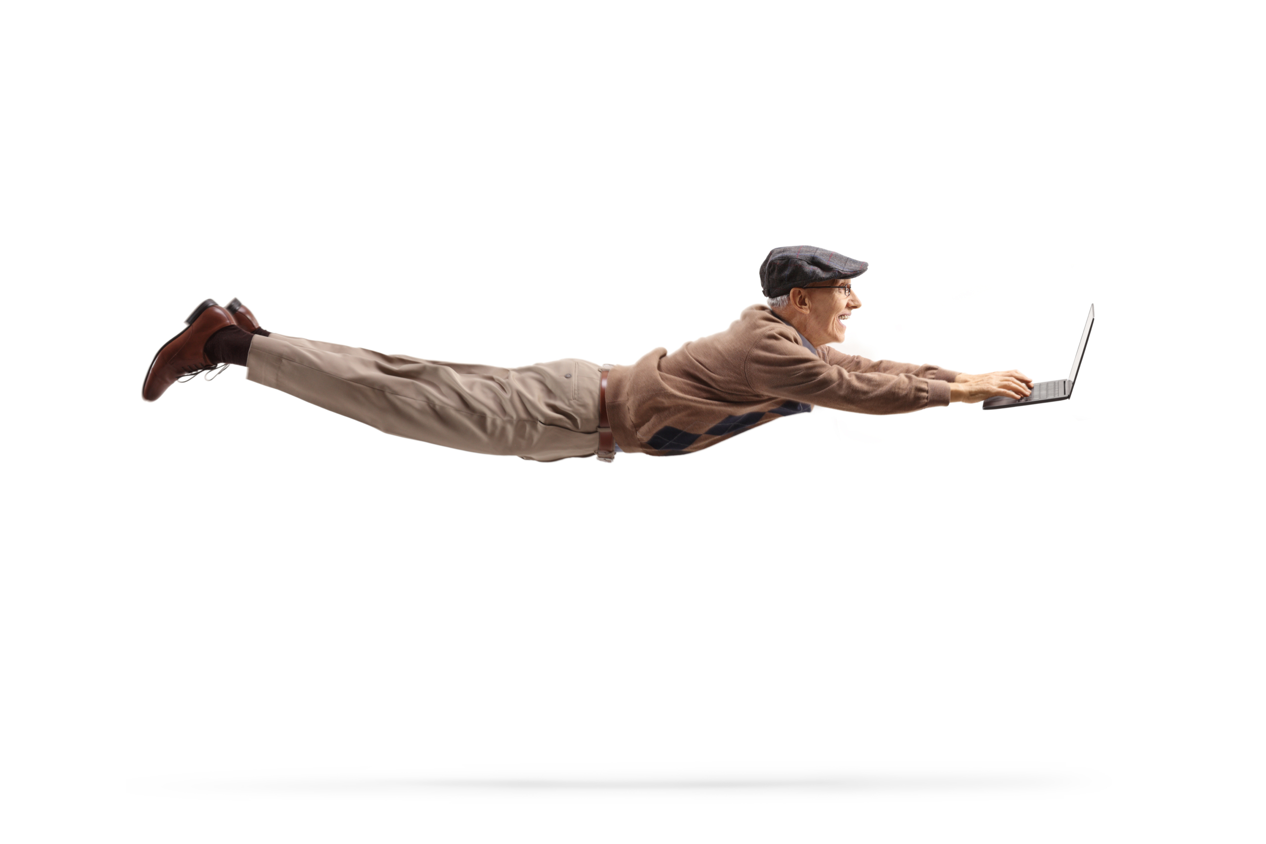 Male senior citizen holding a laptop, flying like Superman